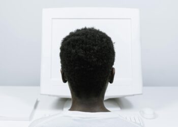 Photo by cottonbro studio: https://www.pexels.com/photo/person-with-afro-hair-using-a-computer-5185177/