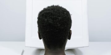 Photo by cottonbro studio: https://www.pexels.com/photo/person-with-afro-hair-using-a-computer-5185177/
