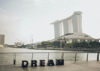 Photo by Elina Sazonova: https://www.pexels.com/photo/dream-lettering-near-fence-overlooking-marina-bay-sands-building-1907049/