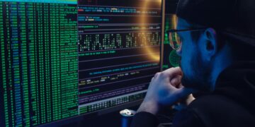 Photo by Mikhail Nilov: https://www.pexels.com/photo/a-man-looking-at-a-computer-screen-with-data-6963944/