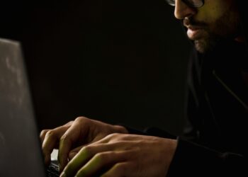 Photo by Sora Shimazaki: https://www.pexels.com/photo/crop-bearded-man-working-on-laptop-in-darkness-5926362/