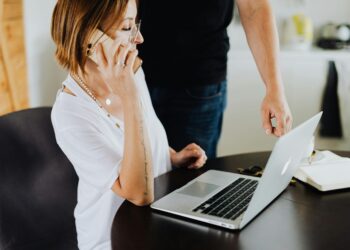 Photo by Karolina Kaboompics: https://www.pexels.com/photo/woman-using-laptop-computer-and-mobile-phone-in-an-office-4968560/