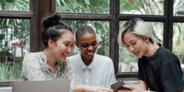 Photo by Ketut Subiyanto: https://www.pexels.com/photo/happy-multiethnic-women-having-fun-while-using-gadgets-in-cafeteria-4350210/