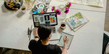 Photo by Antoni Shkraba: https://www.pexels.com/photo/photo-of-woman-writing-on-tablet-computer-while-using-laptop-4348401/