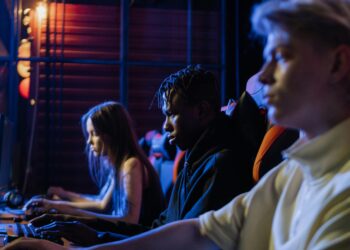 Photo by Alena Darmel: https://www.pexels.com/photo/gamers-playing-together-7862504/