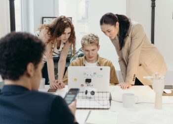 Photo by cottonbro studio: https://www.pexels.com/photo/women-standing-beside-a-man-using-a-laptop-7439129/
