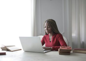 Photo by Andrea Piacquadio: https://www.pexels.com/photo/woman-in-red-long-sleeve-shirt-using-macbook-air-3786763/