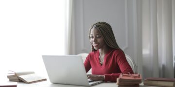 Photo by Andrea Piacquadio: https://www.pexels.com/photo/woman-in-red-long-sleeve-shirt-using-macbook-air-3786763/