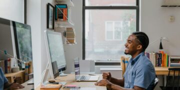 Photo by RDNE Stock project: https://www.pexels.com/photo/man-sitting-by-desk-using-computer-and-laptop-10376169/