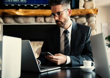 Photo by Snapwire: https://www.pexels.com/photo/man-in-black-holding-phone-618613/