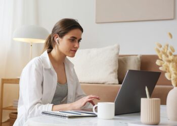 Photo by Artem Podrez: https://www.pexels.com/photo/thoughtful-woman-with-earbuds-using-laptop-4492161/