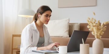 Photo by Artem Podrez: https://www.pexels.com/photo/thoughtful-woman-with-earbuds-using-laptop-4492161/