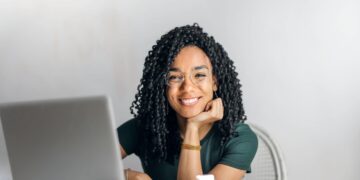 Photo by Andrea Piacquadio: https://www.pexels.com/photo/happy-ethnic-woman-sitting-at-table-with-laptop-3769021/