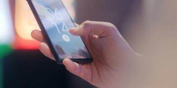 Photo by SCREEN POST: https://www.pexels.com/photo/a-person-holding-a-mobile-phone-12376016/