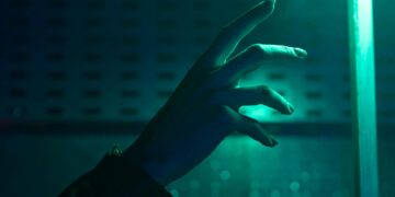 Photo by Mikhail Nilov: https://www.pexels.com/photo/person-s-hand-reaching-out-to-a-light-7709020/