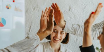 Photo by olia danilevich: https://www.pexels.com/photo/group-of-people-doing-high-five-8145330/