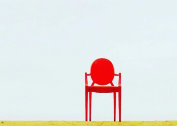 Photo by Waldemar Nowak: https://www.pexels.com/photo/red-armchair-on-brown-surface-910625/