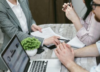 Photo by Mikhail Nilov from Pexels: https://www.pexels.com/photo/a-woman-holding-a-contract-7731330/