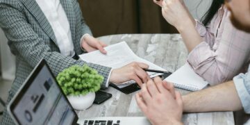 Photo by Mikhail Nilov from Pexels: https://www.pexels.com/photo/a-woman-holding-a-contract-7731330/