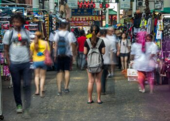 Photo by Seng Lam Ho: https://www.pexels.com/photo/people-walking-on-street-8844213/