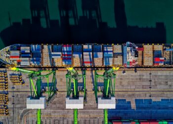 Photo by Tom Fisk: https://www.pexels.com/photo/aerial-view-of-cargo-ship-1554646/