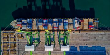 Photo by Tom Fisk: https://www.pexels.com/photo/aerial-view-of-cargo-ship-1554646/