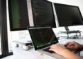 Photo by Christina Morillo: https://www.pexels.com/photo/close-up-photo-of-person-typing-on-laptop-1181675/ developer computer