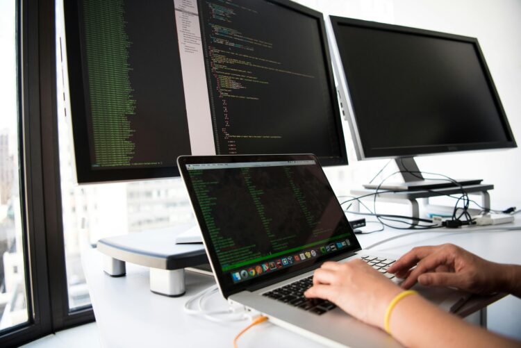 Photo by Christina Morillo: https://www.pexels.com/photo/close-up-photo-of-person-typing-on-laptop-1181675/ developer computer